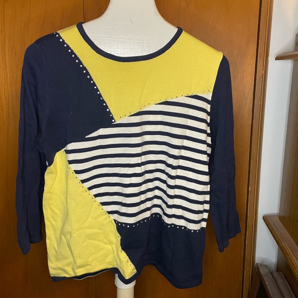 Yellow, black and white sweater